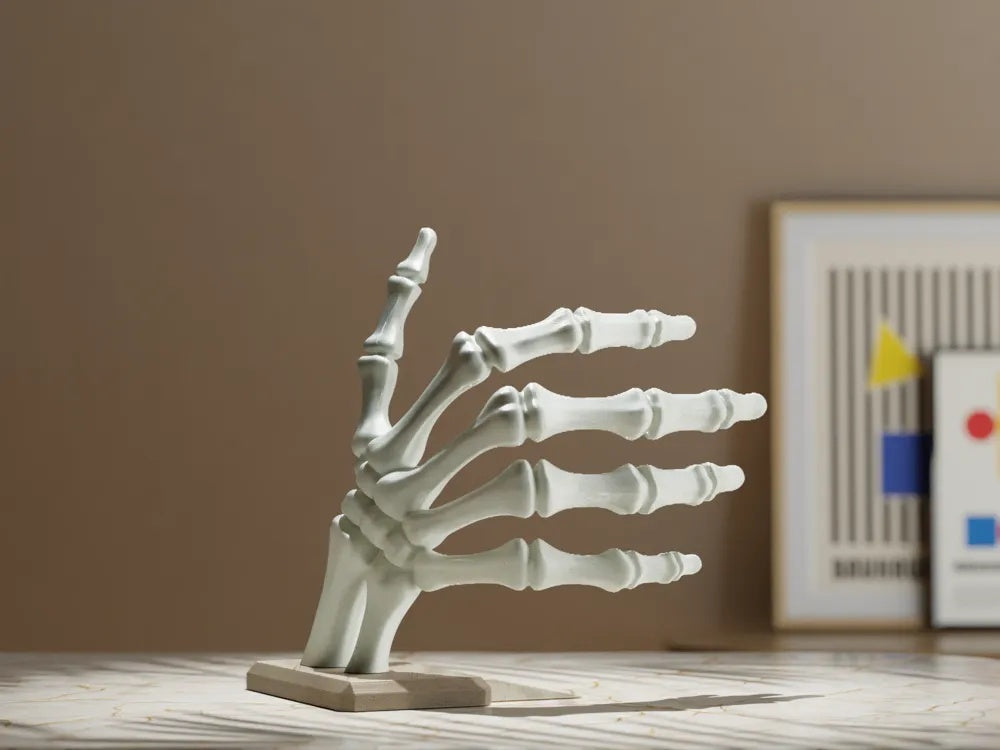 Skeleton hand bookend, view 3