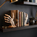 Skeleton hand bookend, view 4